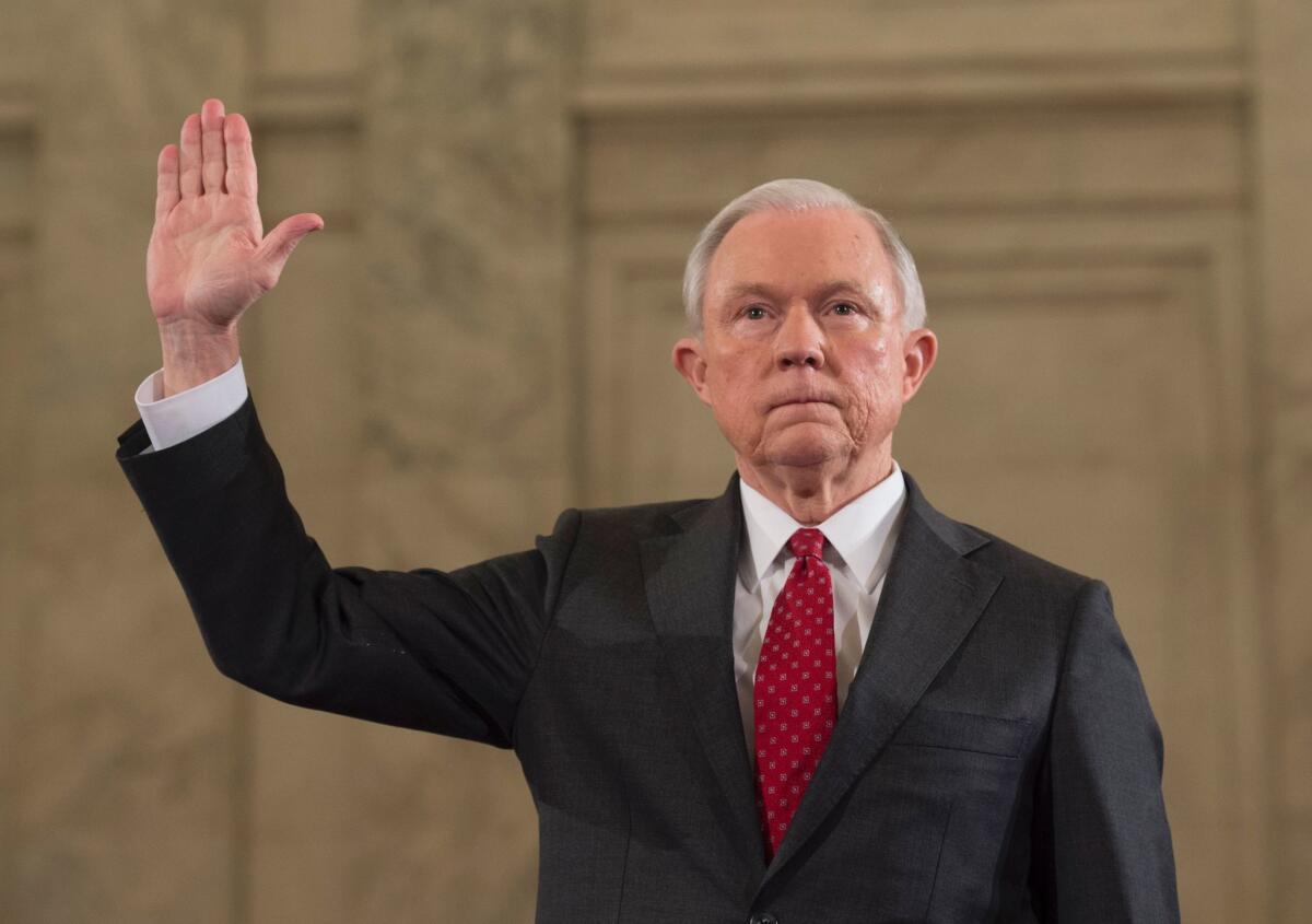 Then-Sen. Jeff Sessions is sworn in before testifying at his confirmation hearing before the Senate Judiciary Committee on Jan. 10.