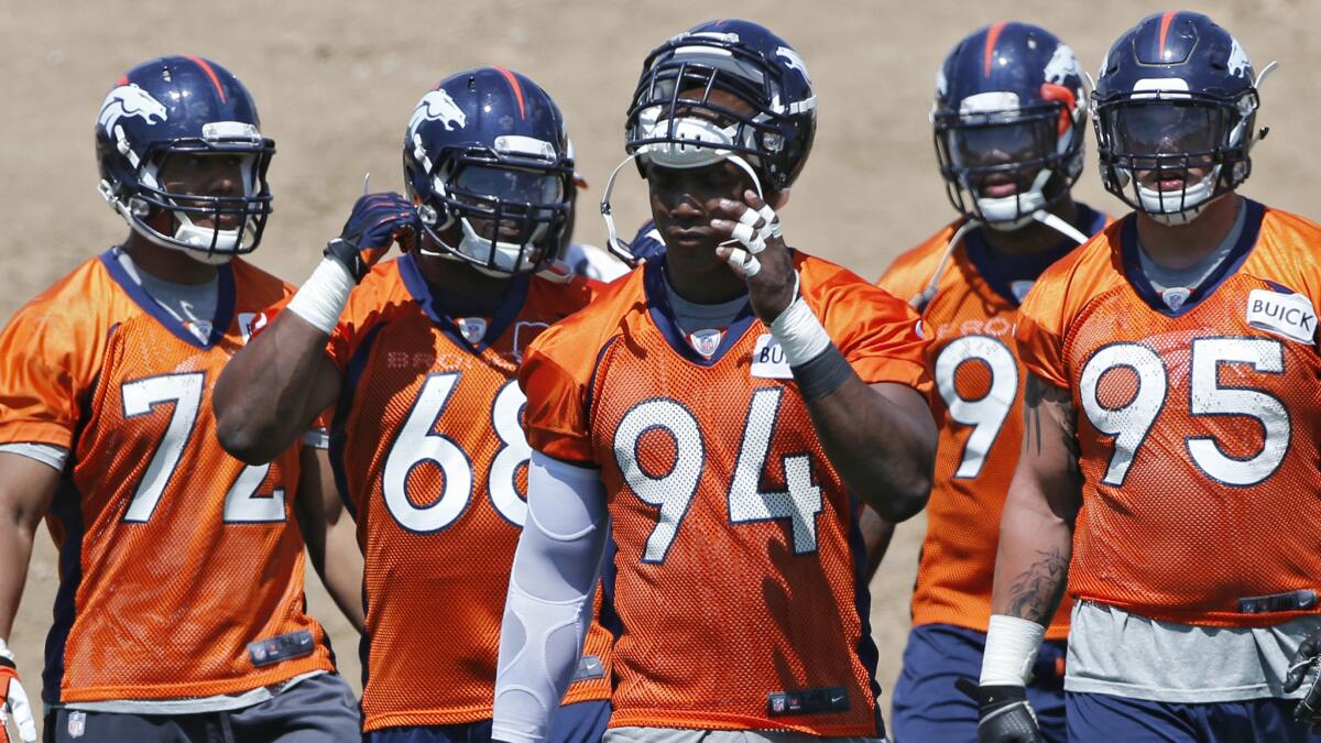 Will defensive end DeMarcus Ware, seen in June, help lead the Broncos back to the Super Bowl in 2015?
