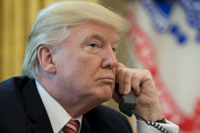epa06052898 US President Donald J. Trump makes a phone call to Prime Minister of Ireland to Leo Varadkar in the Oval Office of the White House in Washington, DC, USA, 27 June 2017. EPA/MICHAEL REYNOLDS ** Usable by LA, CT and MoD ONLY **