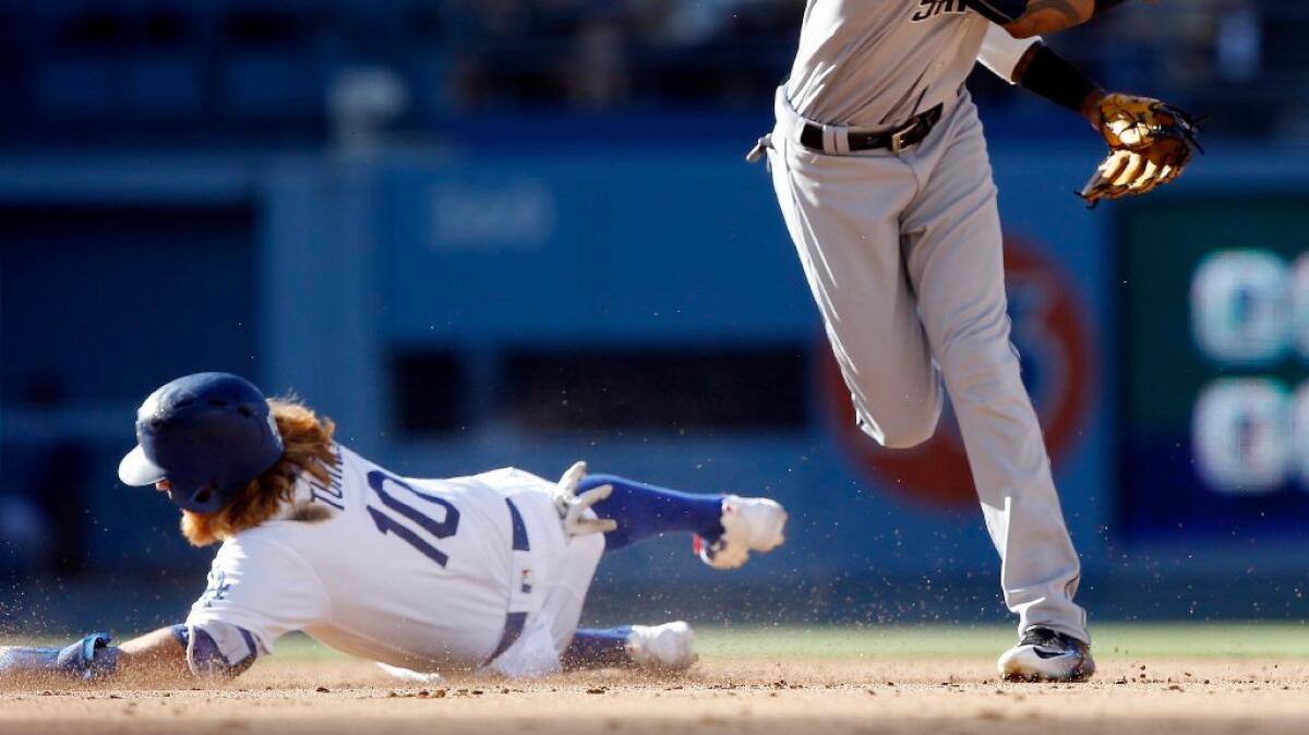 Justin Turner's slide into second base helped break up a potential double play leading to the Dodgers' go-ahead run in the fifth inning of a game Saturday.
