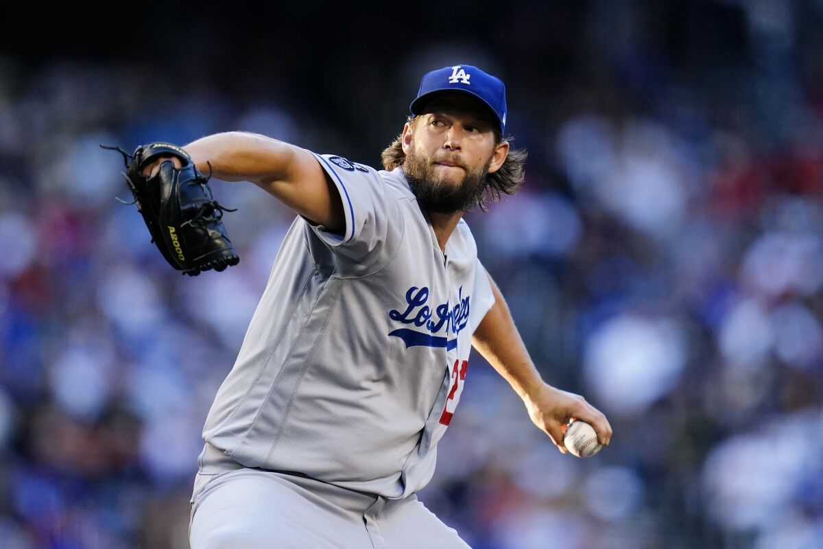 Clayton Kershaw of the Dodgers throws a pitch against the Arizona Diamondbacks on Sept. 25, 2021. 