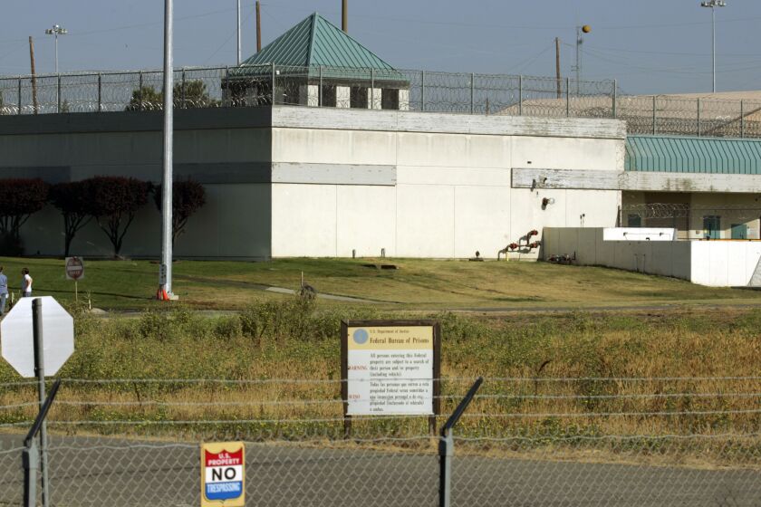 FILE - The Federal Correctional Institution is shown in Dublin, Calif., July 20, 2006. The former warden of a federal women’s prison in California will go on trial Monday, Nov. 28, 2022, after prosecutors say he sexually abused several inmates in his case, forced them to pose nude for him and kept photos of the naked prisoners on his government cellphone. Ray Garcia was the warden at the Federal Correctional Institution in Dublin, Calif. (AP Photo/Ben Margot, File)