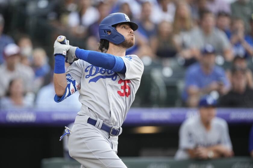 Los Angeles Dodgers center fielder Cody Bellinger (35) in the first inning of a baseball game Friday, July 16, 2021, in Denver. (AP Photo/David Zalubowski)