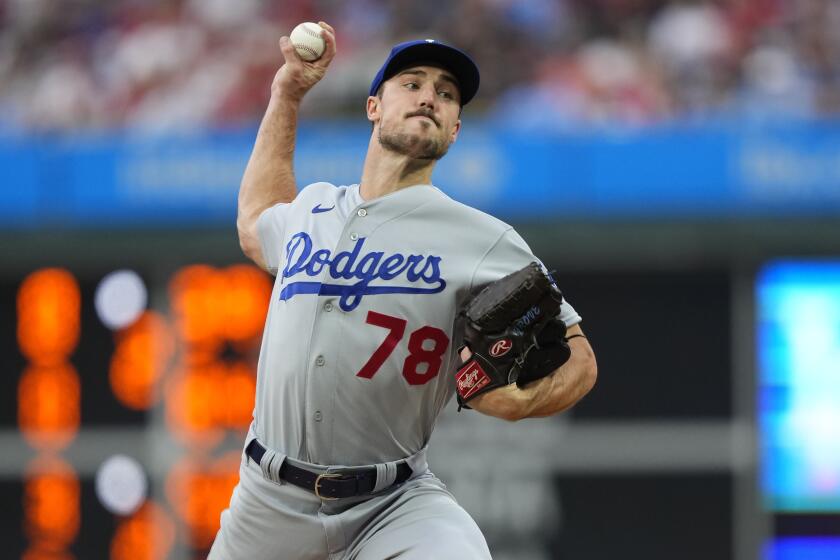 Los Angeles Dodgers' Michael Grove pitches during the first inning of a baseball game against the Philadelphia Phillies.