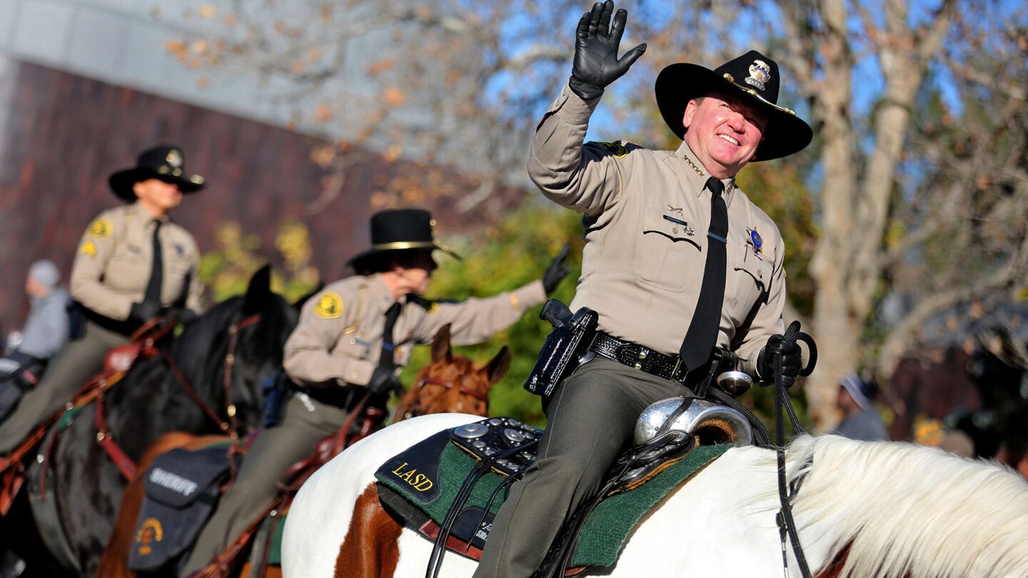 Led by Sheriff Jim McDonnell, The Los Angeles County Sheriff's Department marches down Colorado Boulevard with 20 sworn personnel (Mounted Enforcement Detail) on horseback.