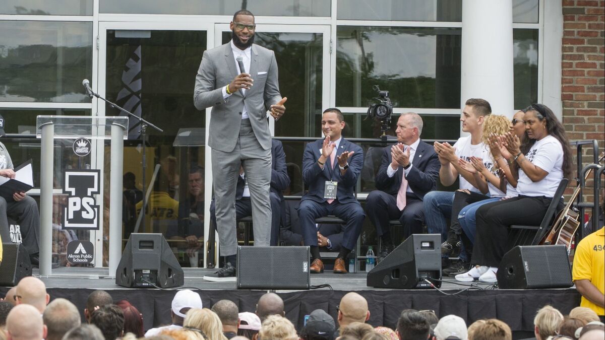LeBron James speaks at the opening ceremony for the I Promise School in Akron, Ohio, on Monday. The new school is supported by the the LeBron James Family Foundation and is run by the Akron Public Schools.
