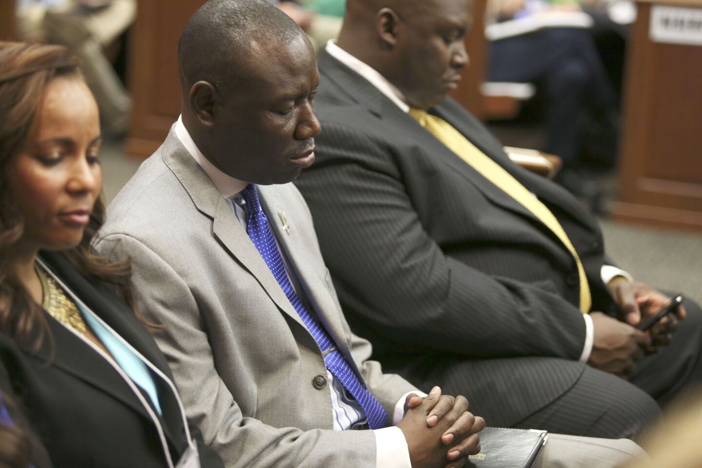 Attorneys Natalie Jackson, left, Benjamin Crump, and Daryl Parks sit in for Trayvon Martin's family during George Zimmerman's trial. Jurors found Zimmerman not guilty of second degree murder in the shooting of Martin last year in Sanford, Fla.