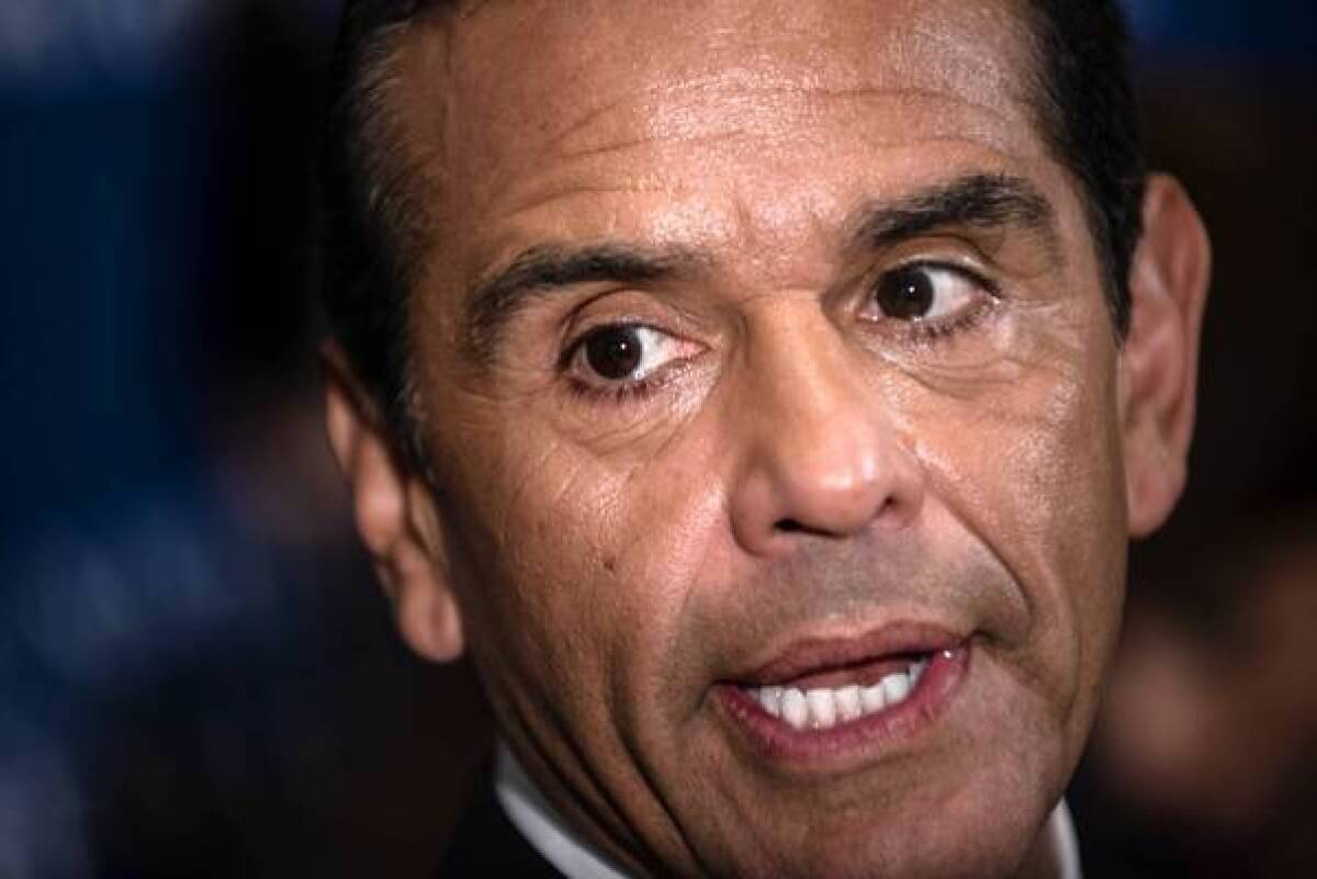Los Angeles Mayor Antonio Villaraigosa speaks at a recent luncheon at the National Press Club in Washington, D.C. The mayor says he has asked the city's three pension funds to review all investments and work to end those in companies that manufacture assault weapons.