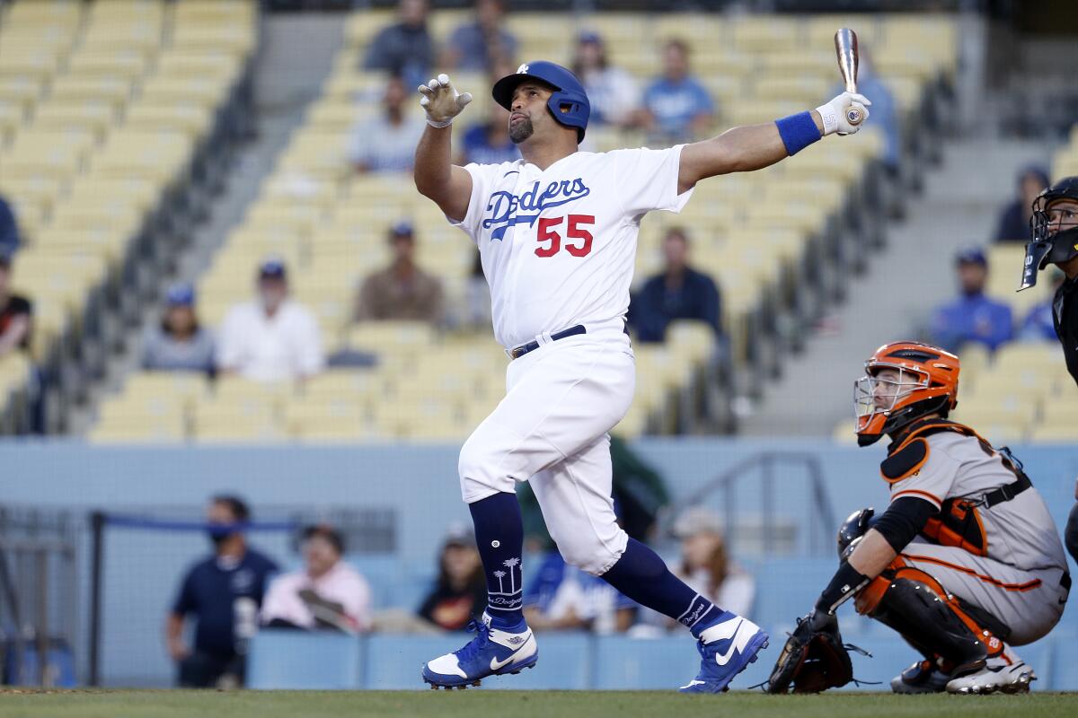 Dodgers first baseman Albert Pujols hits a home run, tying Babe Ruth for career extra-base hits.