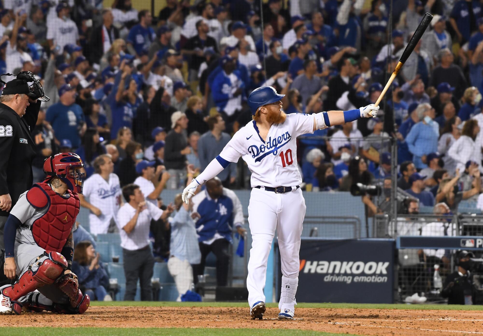 Los Angeles Dodgers' Justin Turner looks up after hitting a solo home run to tie the game