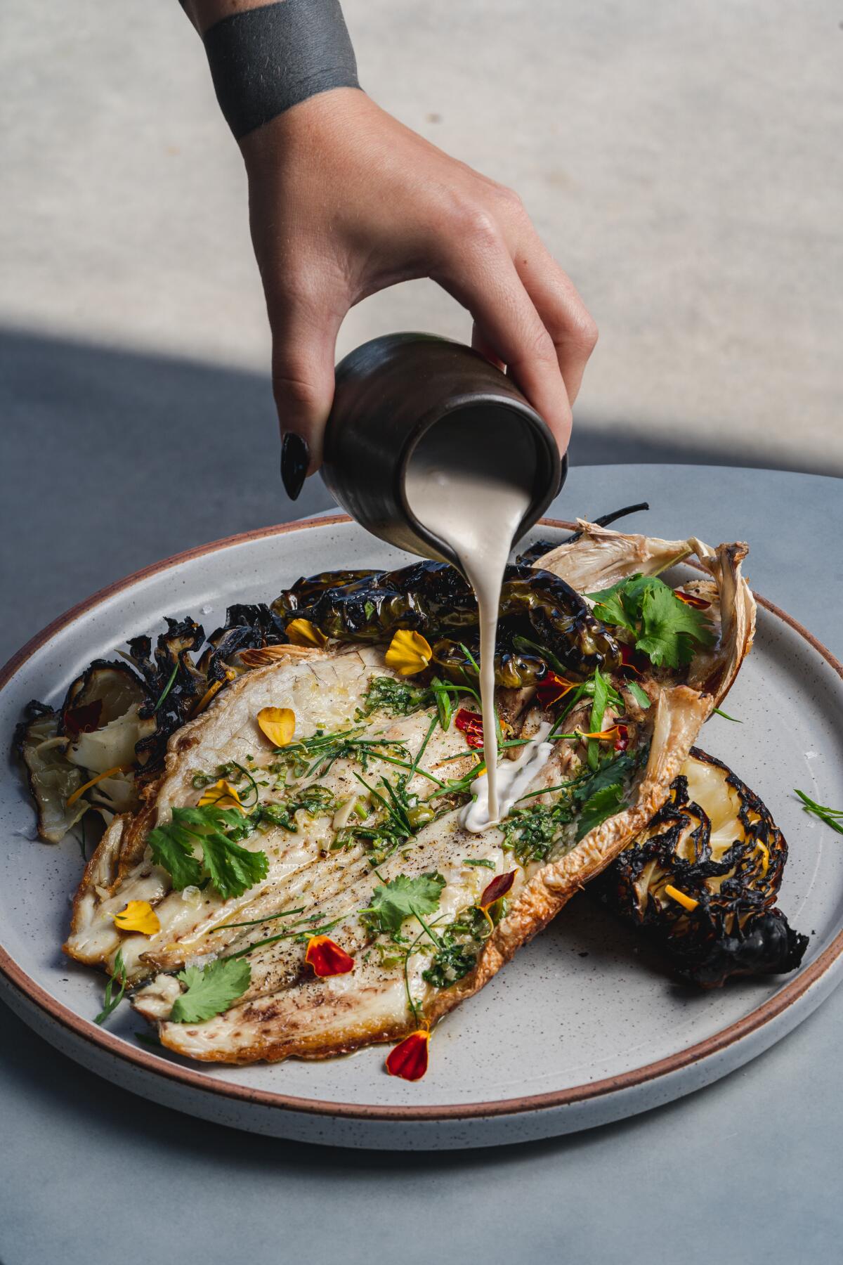 The Baja sea bass at VAGA restaurant, which opens May 5 at Alila Marea Beach Resort Encinitas.