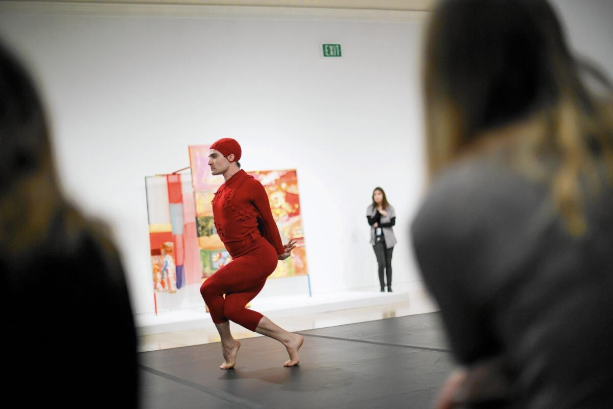 Silas Riener performs the Merce Cunningham work “Changeling” at the Hammer, which is showing “Leap Before You Look.”