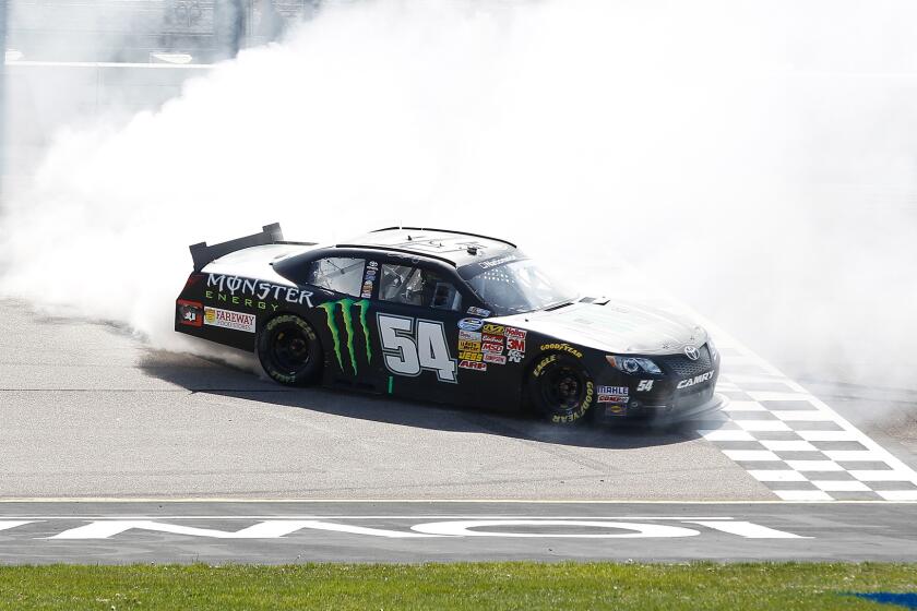Sam Hornish Jr. celebrates after winning Sunday's NASCAR Nationwide Series race at Iowa Speedway.