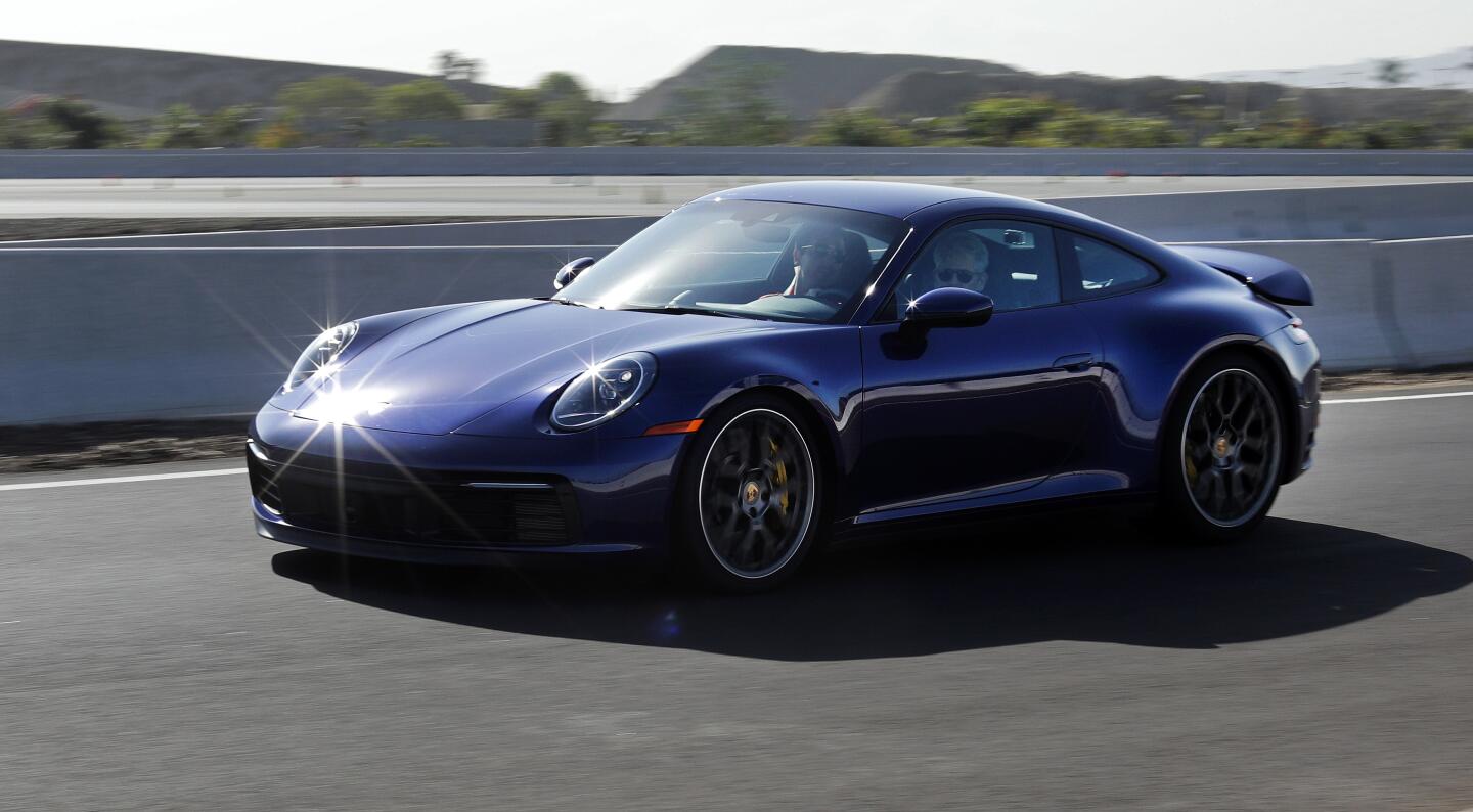 CARSON, CA -- NOVEMBER 26, 2019: The 2020 Porsche 911 Carrera 4S is powered by a 3-liter, 6-cylinder, twin-turbo engine that makes 443 horsepower and 390 pound-feet of torque. The 8-speed automatic will take the car up to a claimed top speed of 190 mph for the hard top and 188 mph for the cabriolet. The MSRP starts at $120,600 for the hard top. (Myung J. Chun / Los Angeles Times)