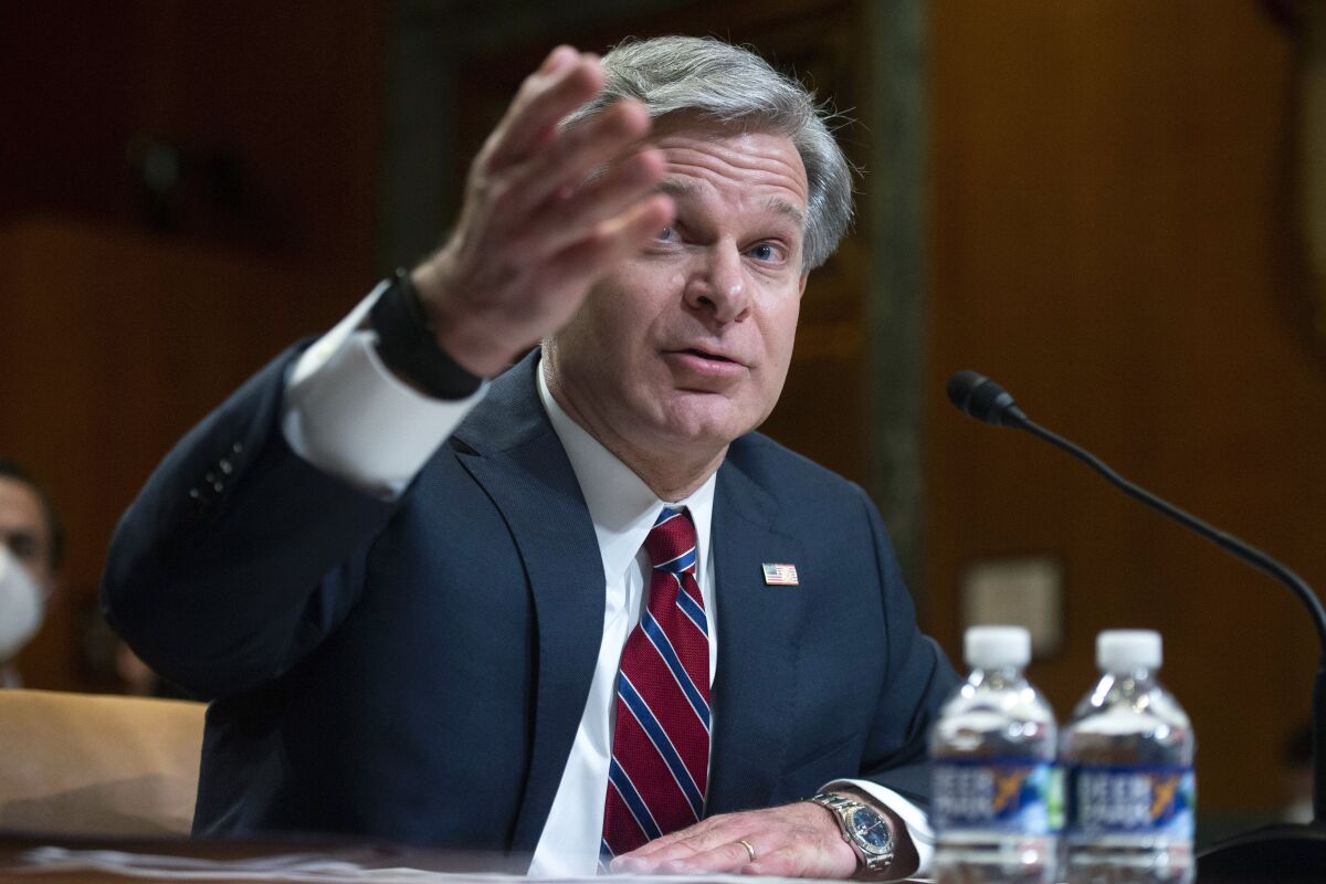 FILE - FBI director Christopher Wray testifies during a Senate Appropriations Subcommittee hearing in Washington