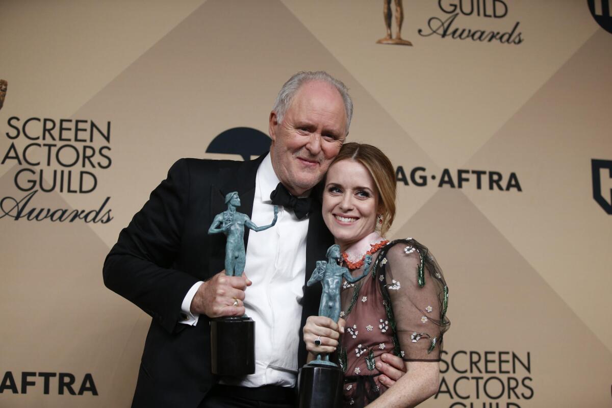 "The Crown's" John Lithgow, winner for male actor in a drama series, with costar Claire Foy, winner for female actor in a drama series.