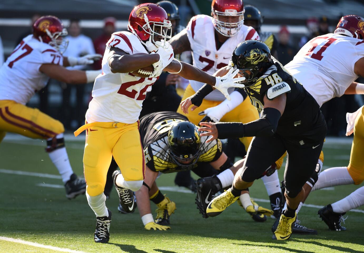 Tailback Justin Davis gives a solid effort in USC's loss at Oregon