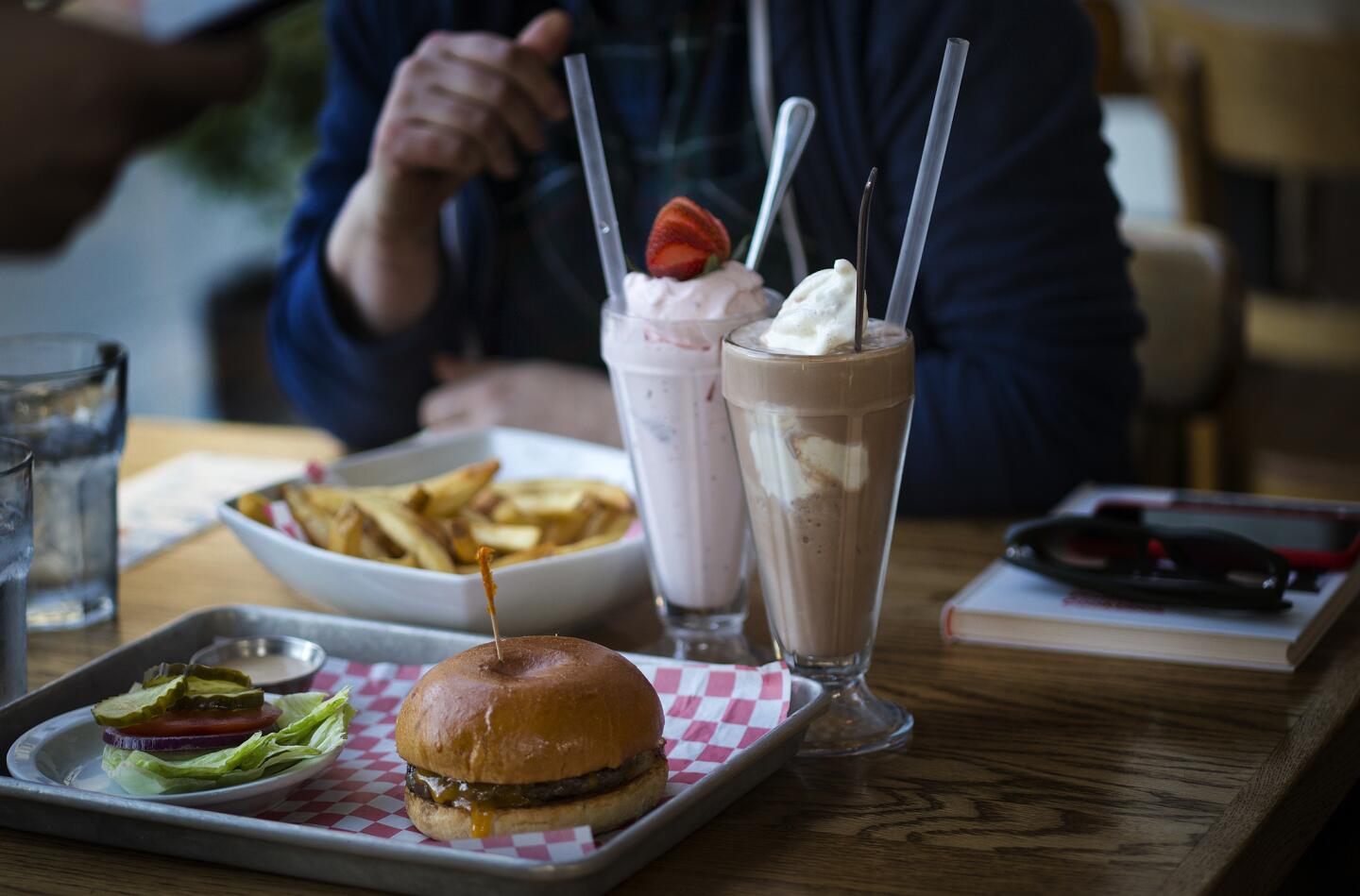 The classic burger, fries and strawberry and chocolate milkshakes at Cassell's.