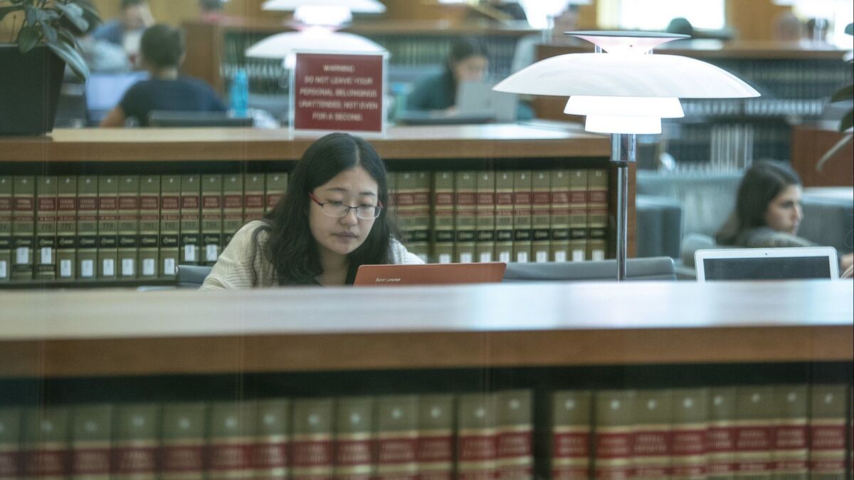 A student studies at UC Berkeley's law school in Berkeley, Calif. on Oct. 9.