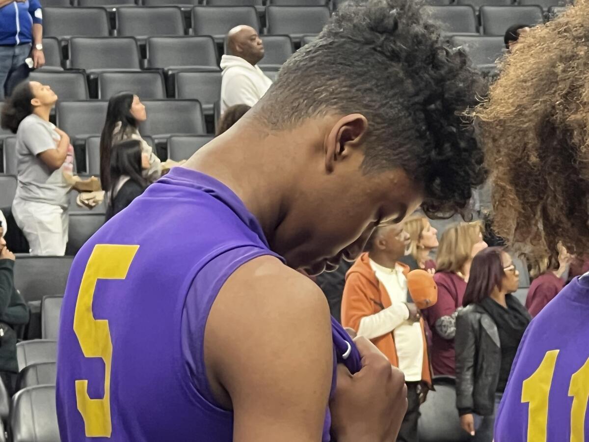 Freshman Jason Crowe Jr. of Lynwood High gets focused along the sideline before the Division V state championship game.