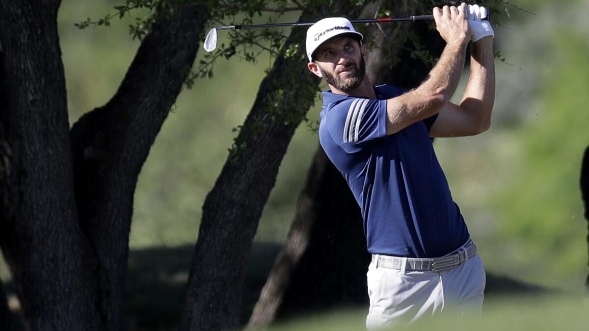 Dustin Johnson breezed into the quarterfinals of the Match Play tournament Saturday and held off a mid-round challenge from Alex Noren to advance to Sunday's semifinals. (Eric Gay / Associated Press)