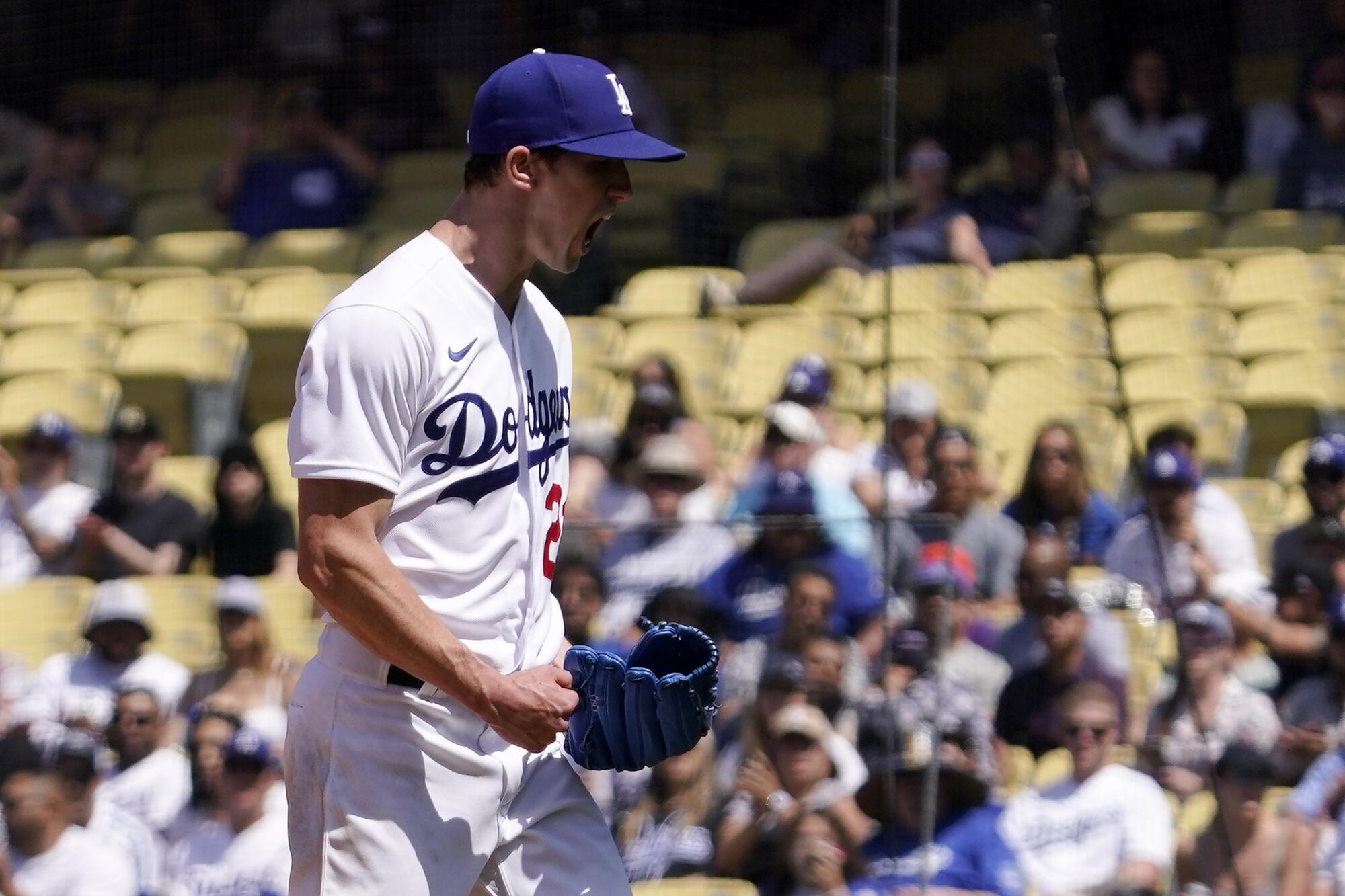 Dodgers starter Walker Buehler celebrates as the final out is made in the fourth inning with the bases loaded in May 2022.