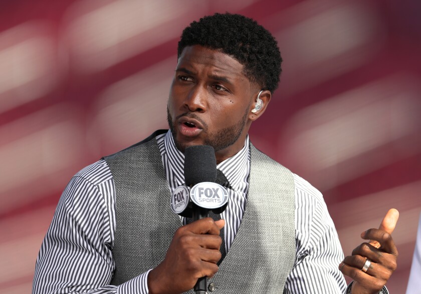 Former USC running back Reggie Bush attends the USC game against Utah as a guest on the pregame show on Sept. 20, 2019.
