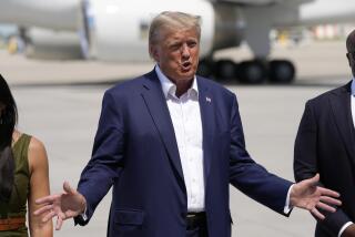 Republican presidential candidate former President Donald Trump speaks to reporters at the Des Moines International Airport after a visit to the Iowa State Fair, Saturday, Aug. 12, 2023, in Des Moines, Iowa. (AP Photo/Charlie Neibergall)