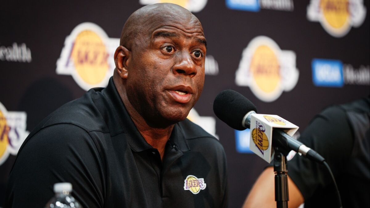 Magic Johnson, the Lakers' president of basketball operations, is on his way to Philadelphia to meet with players.
