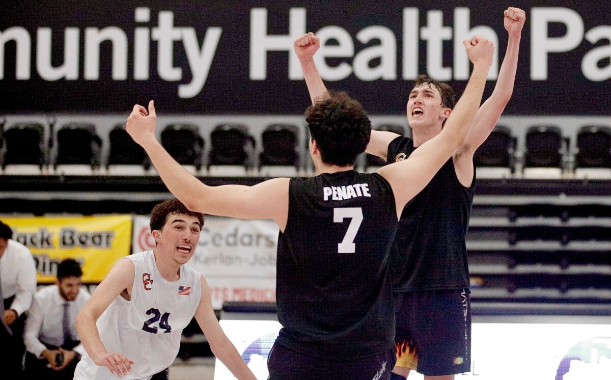 Blake Pohevitz, right, celebrates with his Chatsworth teammates after their City Section Open Division championship victory.