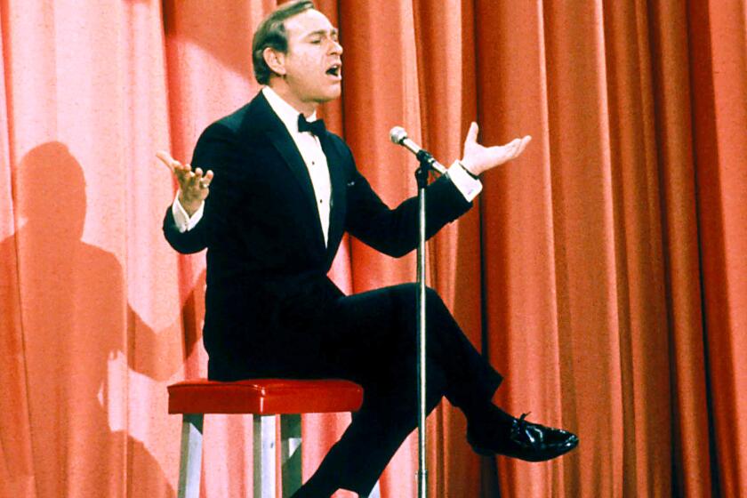 Shelley Berman performed his comedy routines, such as this one circa 1970, sitting on a custom stool.