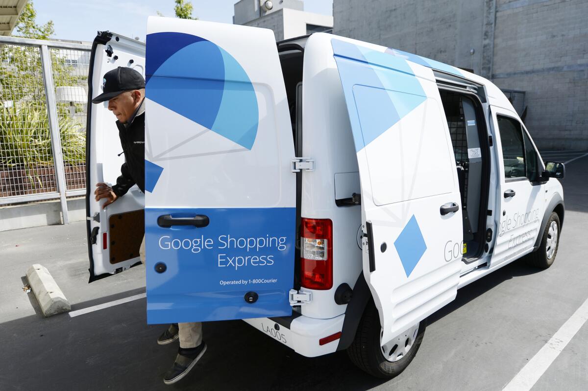 A Google Shopping Express van is seen on May 5 in Los Angeles. Google rebranded the service to simply Google Express this week.
