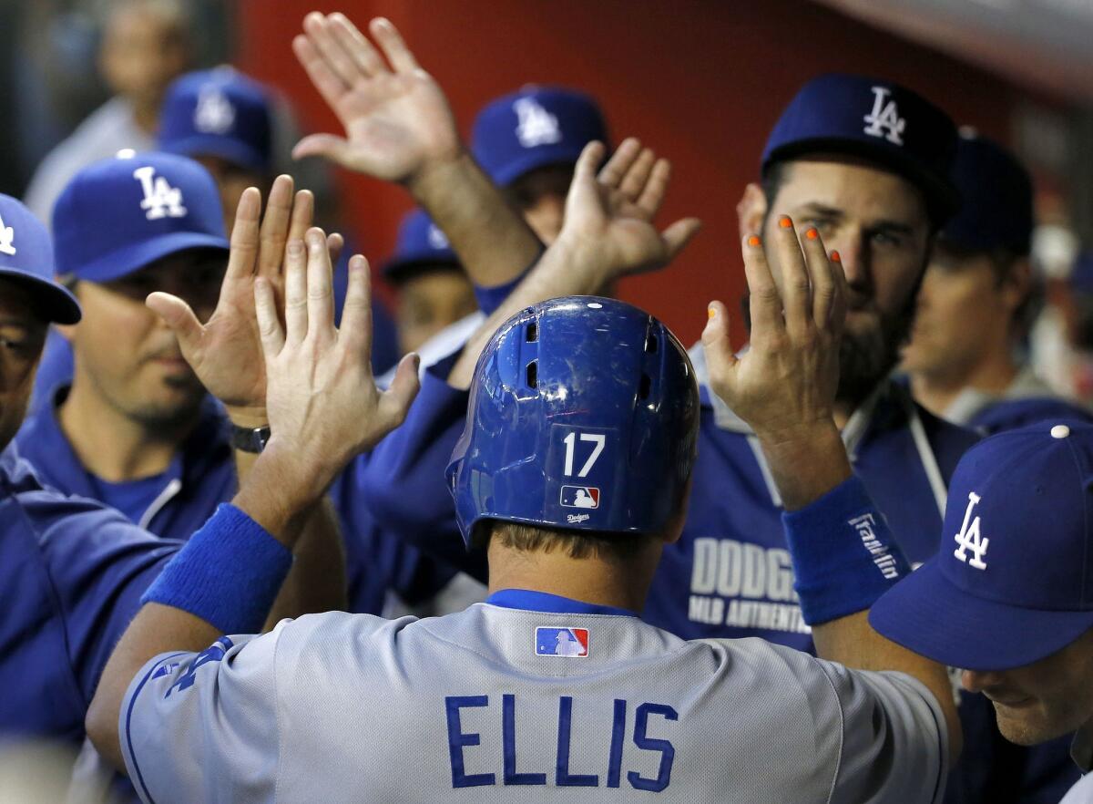 The Dodgers activated catcher A.J. Ellis from the disabled list Friday. Ellis suffered an ankle injury while celebrating Josh Beckett's no-hitter on May 25.