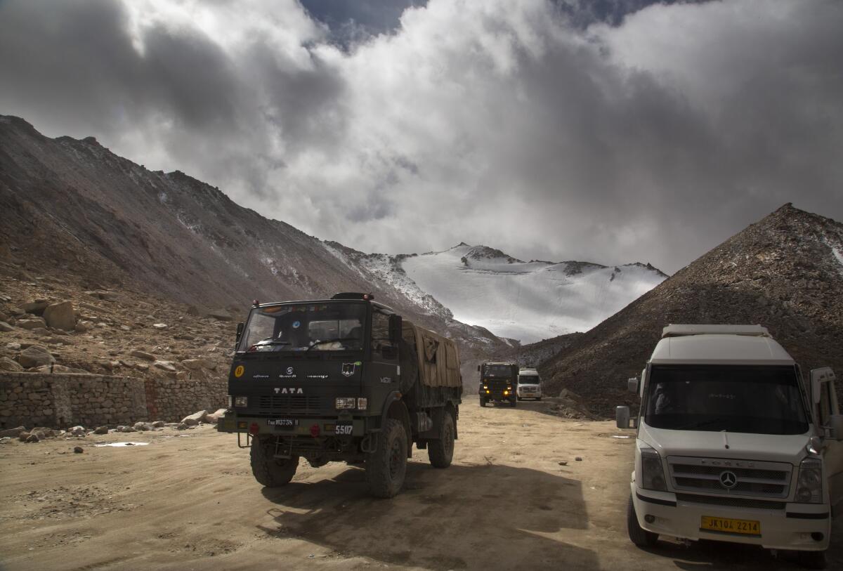 An Indian army truck drives near Pangong Lake in India's Ladakh border region in 2018.