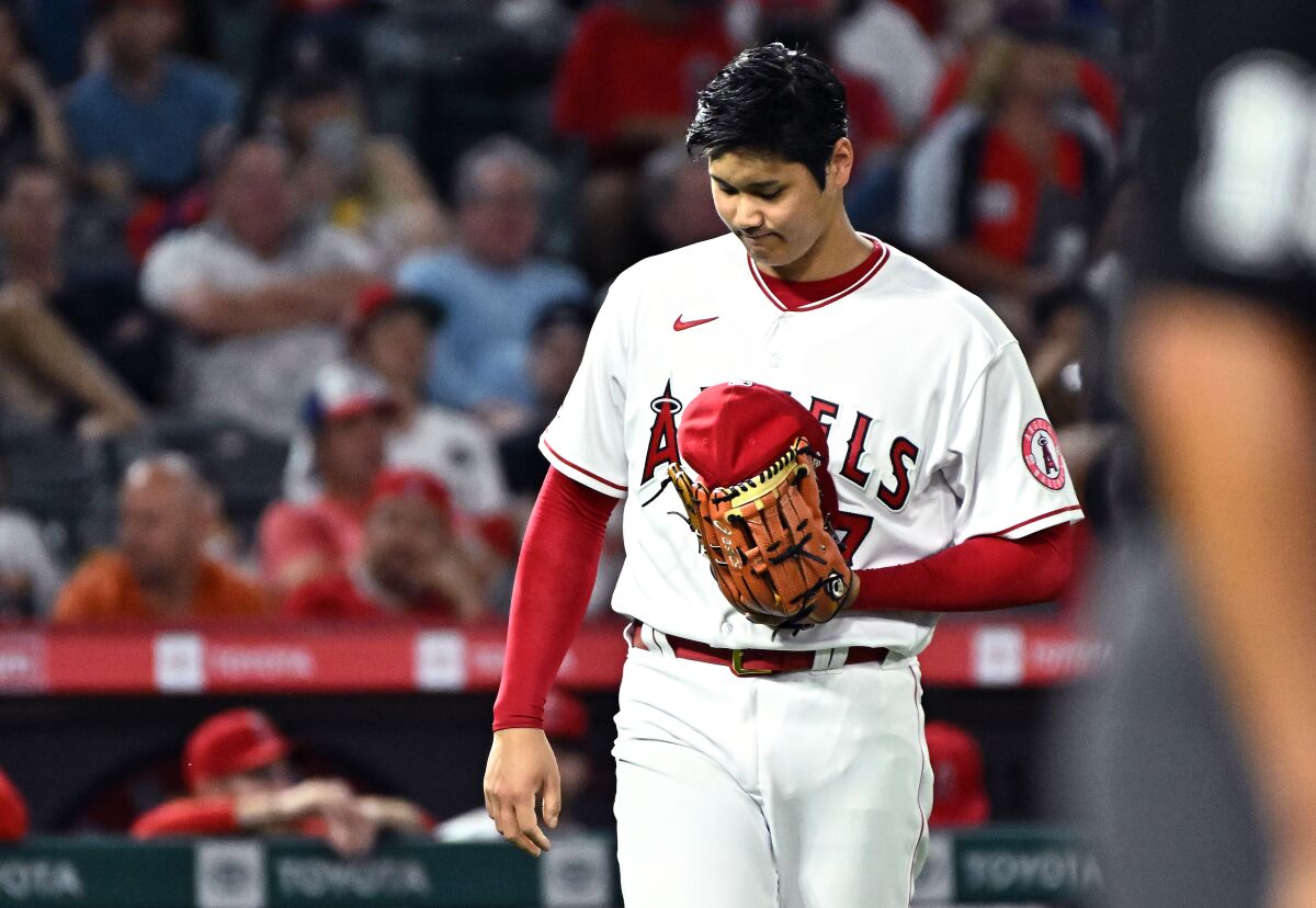 Angels pitcher Shohei Ohtani reacts after giving up a double to Houston's Michael Brantley in the third inning Friday.
