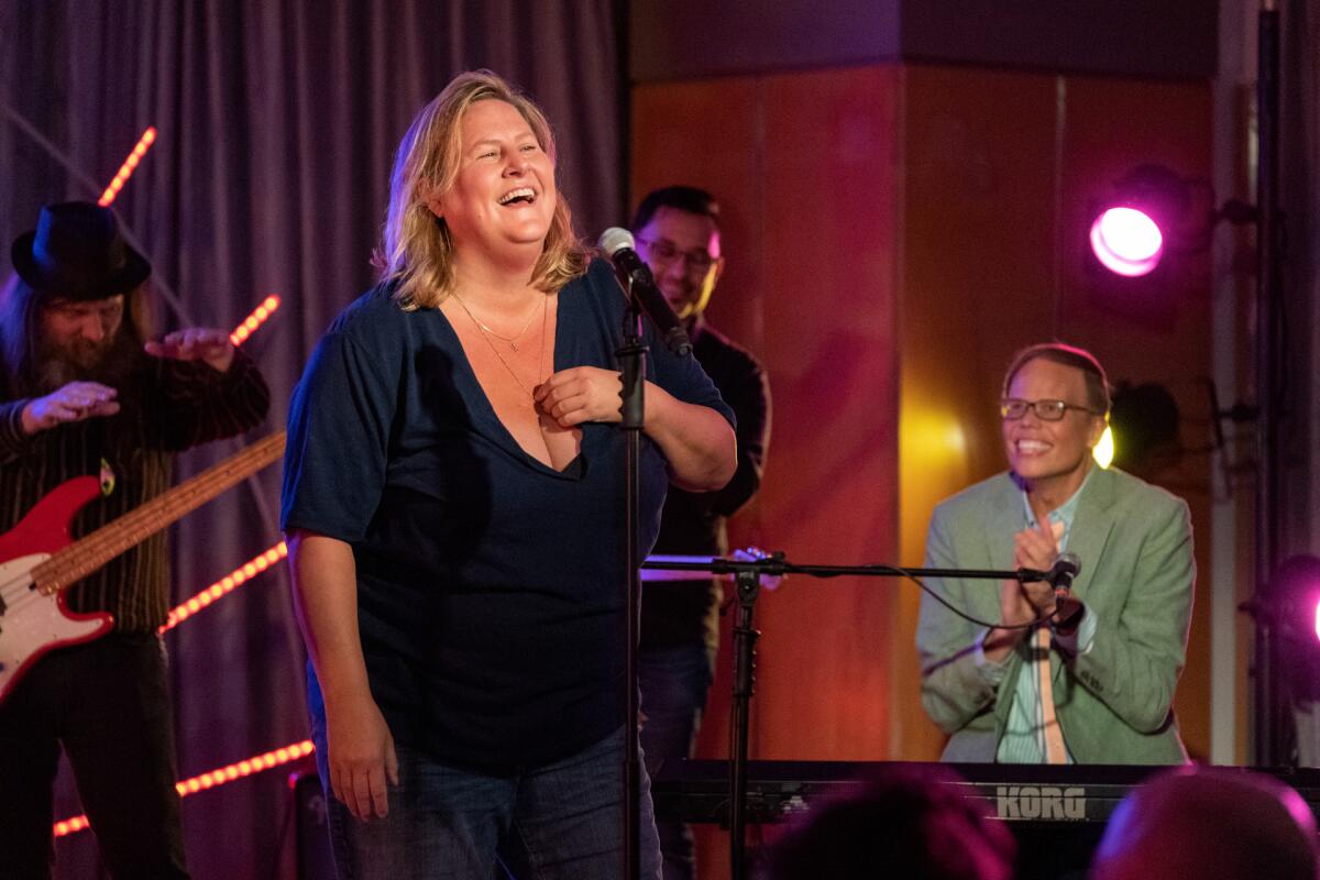 Bridget Everett sings onstage with Jeff Hiller at the keyboards in a scene from "Somebody Somewhere."