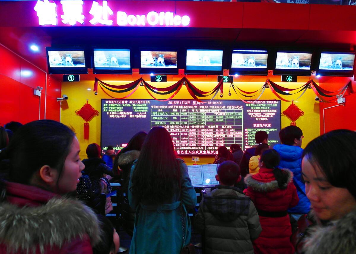 A movie theater in Beijing, China. This week, the film"Mr. Six” soared past the $100-million mark at the Chinese box office last week.