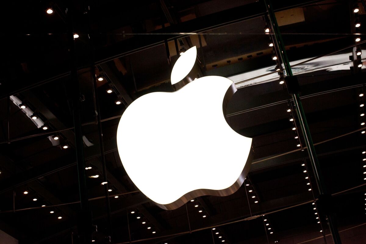 The Apple logo is seen inside an Apple store in New York in October 2011.
