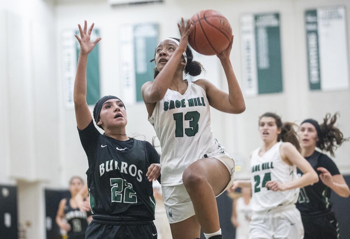 Sage Hill's Zoie Lamkin goes up for a shot against Ridgecrest Burroughs in a CIF Southern Section Division 3AA quarterfinal.