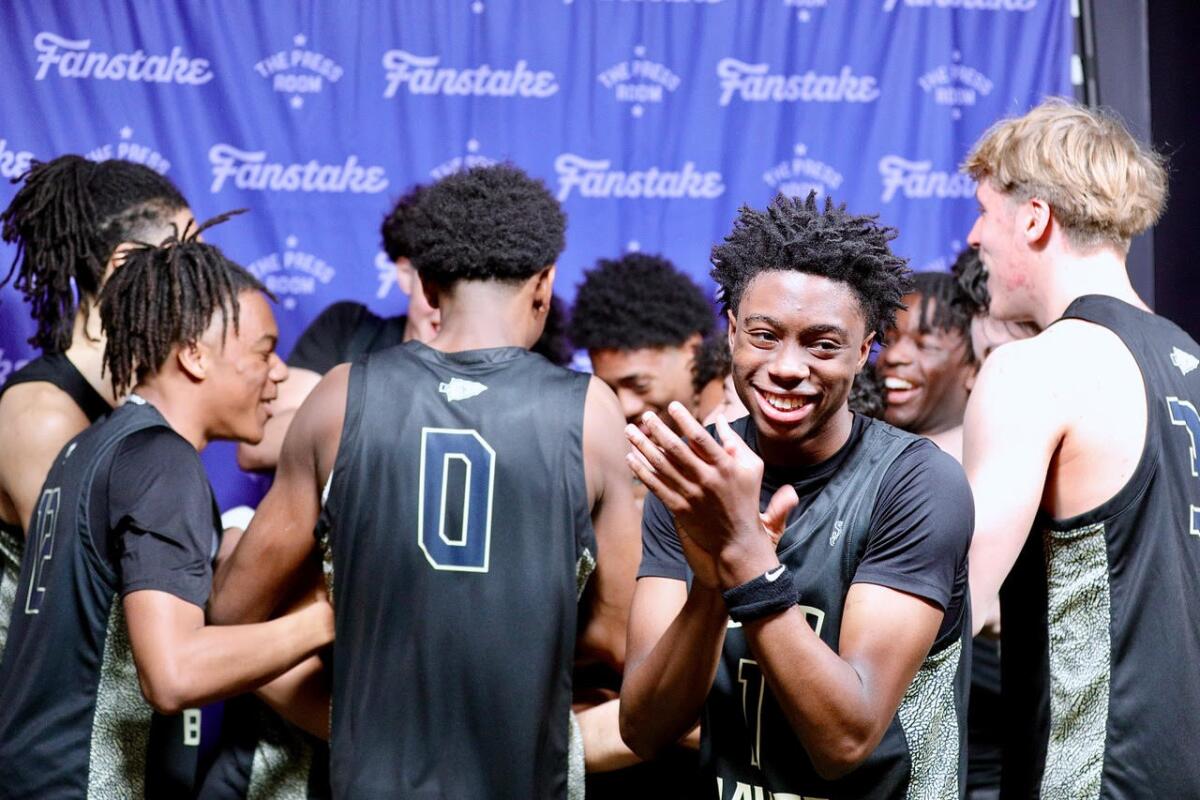 St. John Bosco players celebrate after beating Mater Dei at Intuit Dome on Saturday.