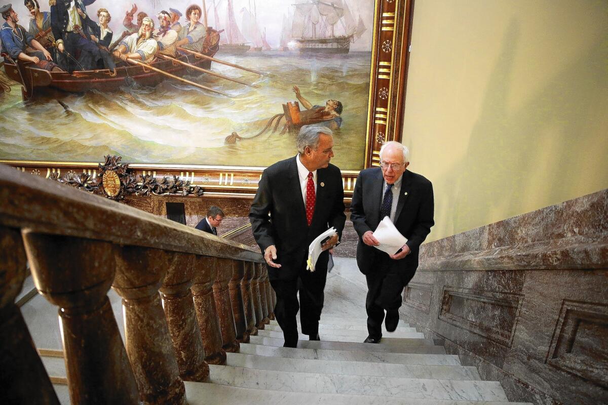 Rep. Jeff Miller (R-Fla.), left, and Sen. Bernie Sanders (I-Vt.) announced a deal on legislation to reform the Department of Veterans Affairs.