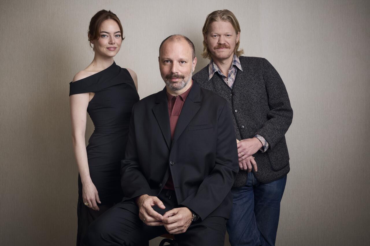 From left to right, Emma Stone, Yorgos Lanthimos and Jesse Plemons of