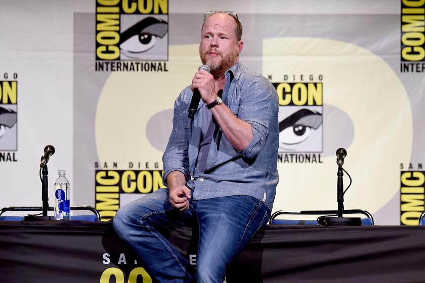 "Buffy the Vampire Slayer" creator and "Avengers" director Joss Whedon answers questions during a panel at Comic-Con. Whedon returned to Twitter on Wednesday to promote his new super PAC.