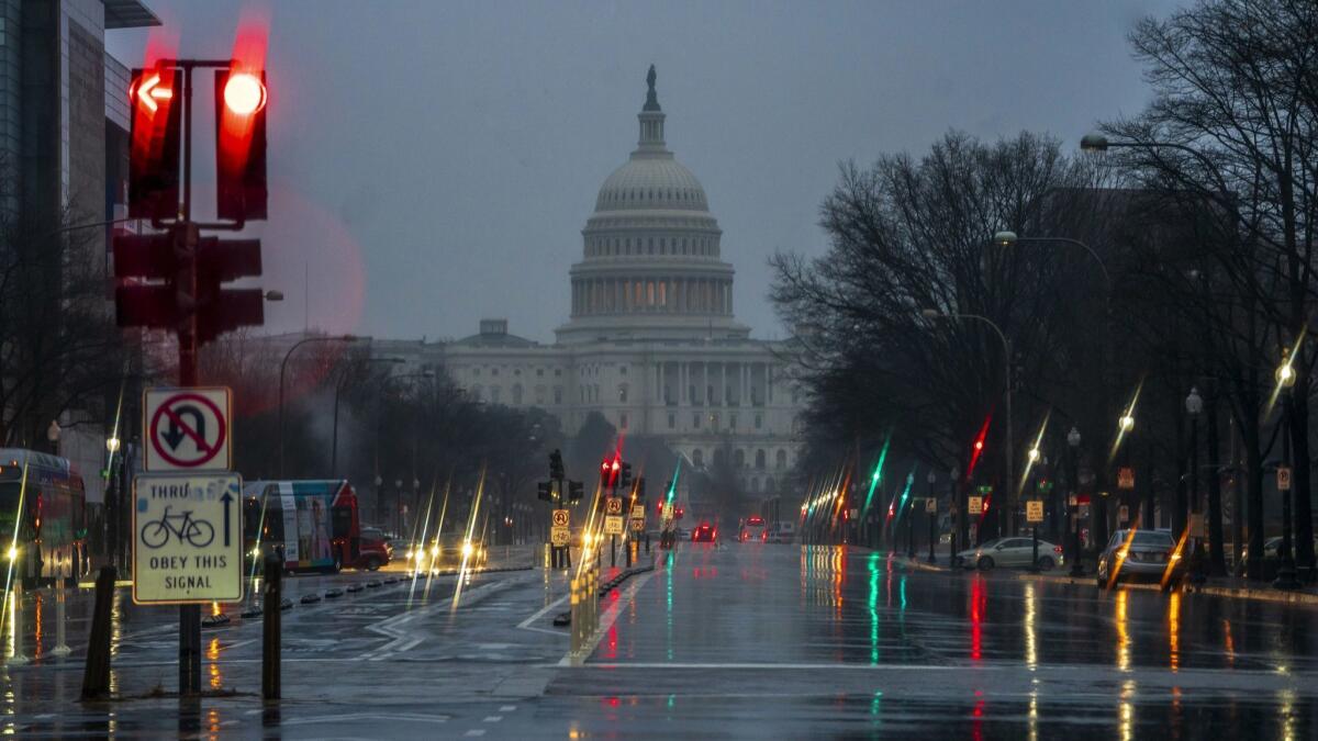 The Capitol is seen on a rainy morning in Washington, Friday, Dec. 28, 2018, during a partial government shutdown. President Donald Trump is threatening to close the U.S. border with Mexico if Democrats in Congress don't agree to fund the construction of a border wall. Trump tweeted Friday morning that "We will be forced to close the Southern Border entirely," unless a funding deal is reached with "the Obstructionist Democrats." Trump's demand for money to build the border wall and Democrats' refusal to give him what he wants has caused a partial government shutdown that is nearly a week old. (AP Photo/J. Scott Applewhite)
