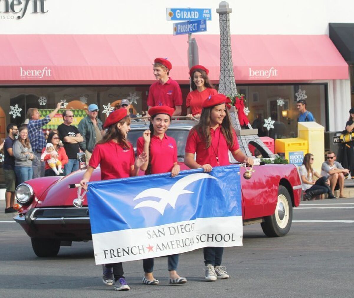 Beret-sporting San Diego French-American School students join in the La Jolla Christmas Parade in 2014.