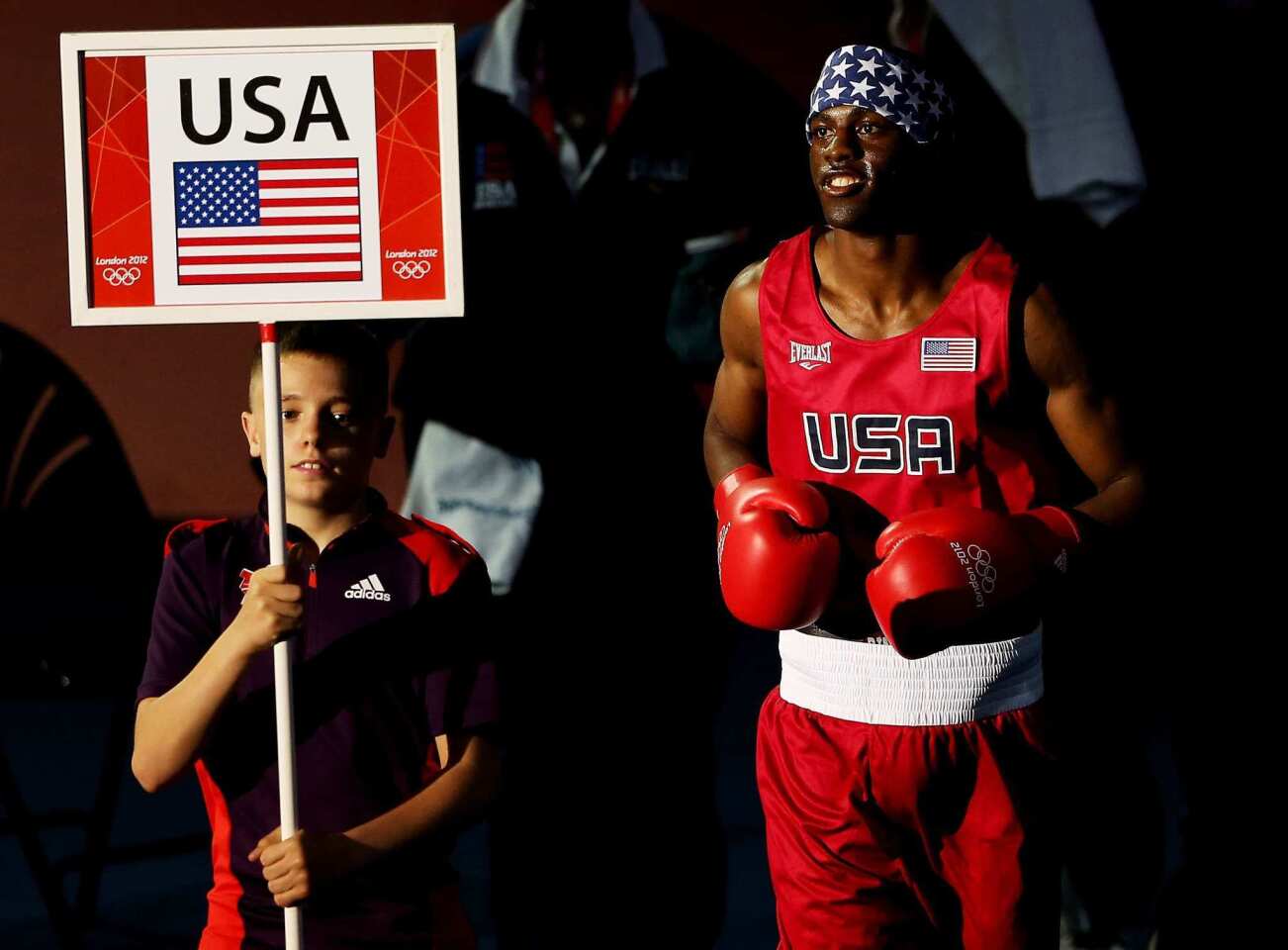 U.S. boxer Jamel Herring enters the ring prior to his men's light-welterweight bout with Daniyar Yeleussinov of Kazakhstan at the London Olympics.