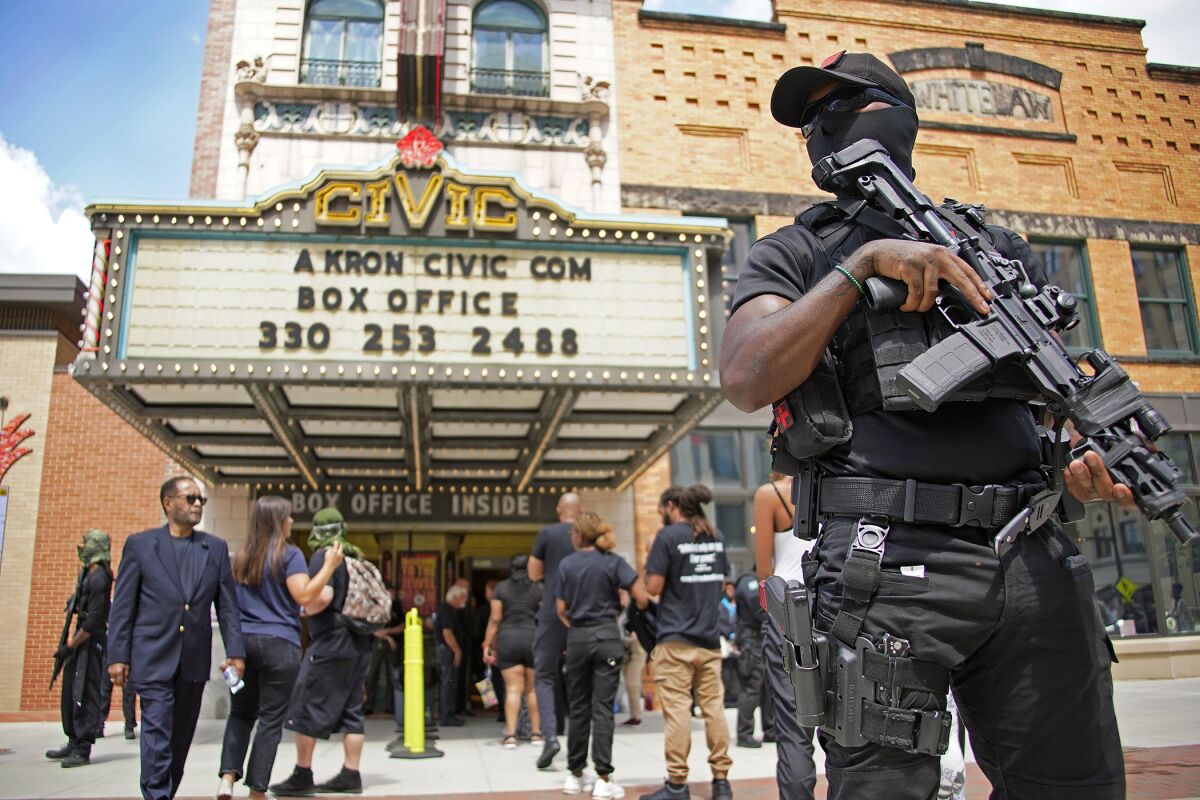 People wait to get into the Akron Civic Center for a public viewing for Jayland Walker in Akron, Ohio, Wednesday, July 13, 2022. On June 27, 2022, Walker was unarmed when Akron police chased him on foot and killed him in a hail of bullets, but officers believed he had shot at them earlier from a vehicle and feared he was preparing to fire again, authorities said. (AP Photo/Gene J. Puskar)