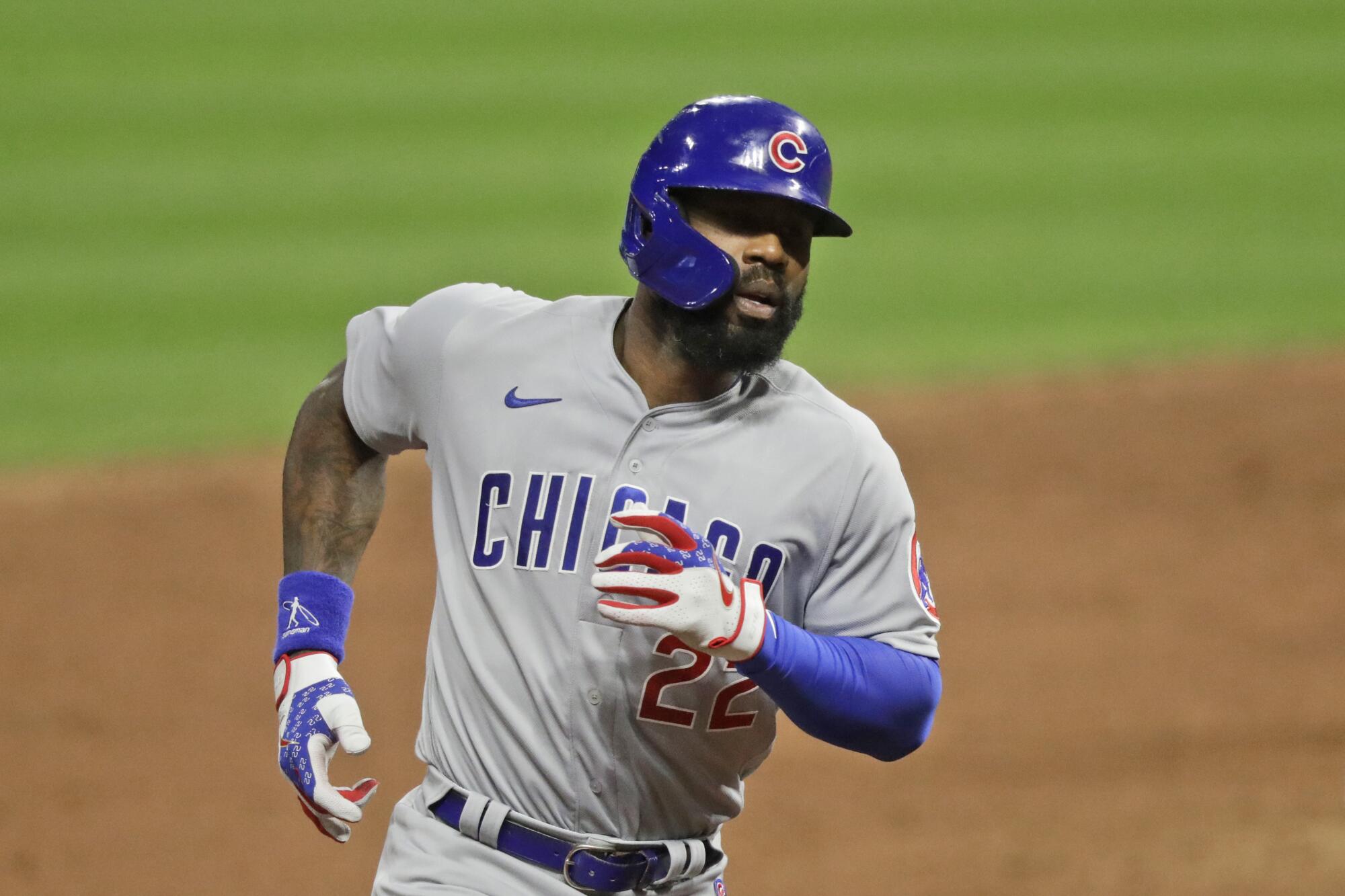 Chicago Cubs' Jason Heyward rounds the bases after hitting a three-run home run in the sixth inning against Cleveland.