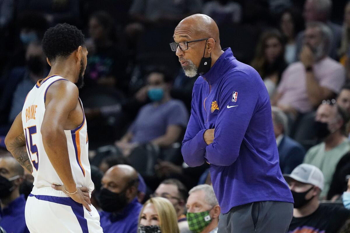 Suns coach Monty Williams working 1-on-1 with Cam Johnson on post play