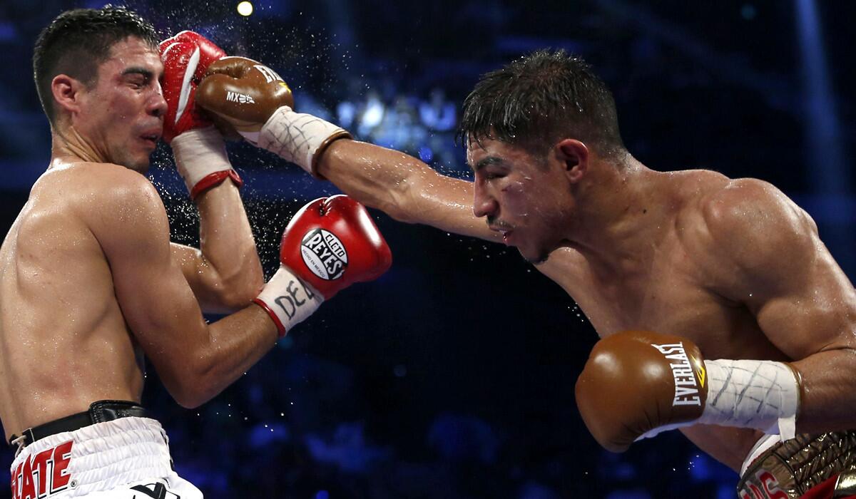 Jessie Vargas lands a right to against Antonio DeMarco during their WBA super-lightweight title bout on Nov. 23, 2014 in Macao.